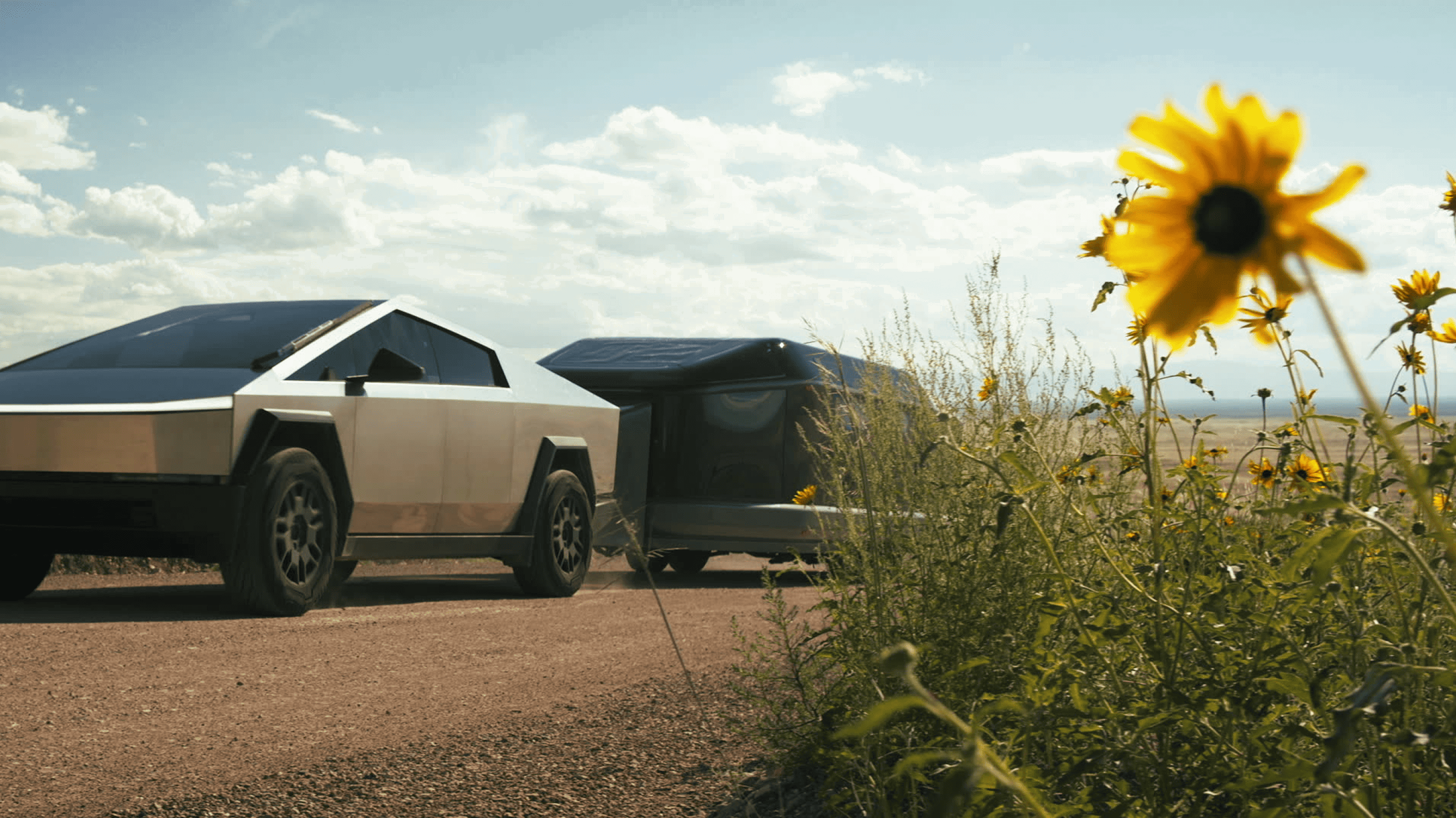 Lightship third hero image with a tesla cyber truck and a beautiful sunflower