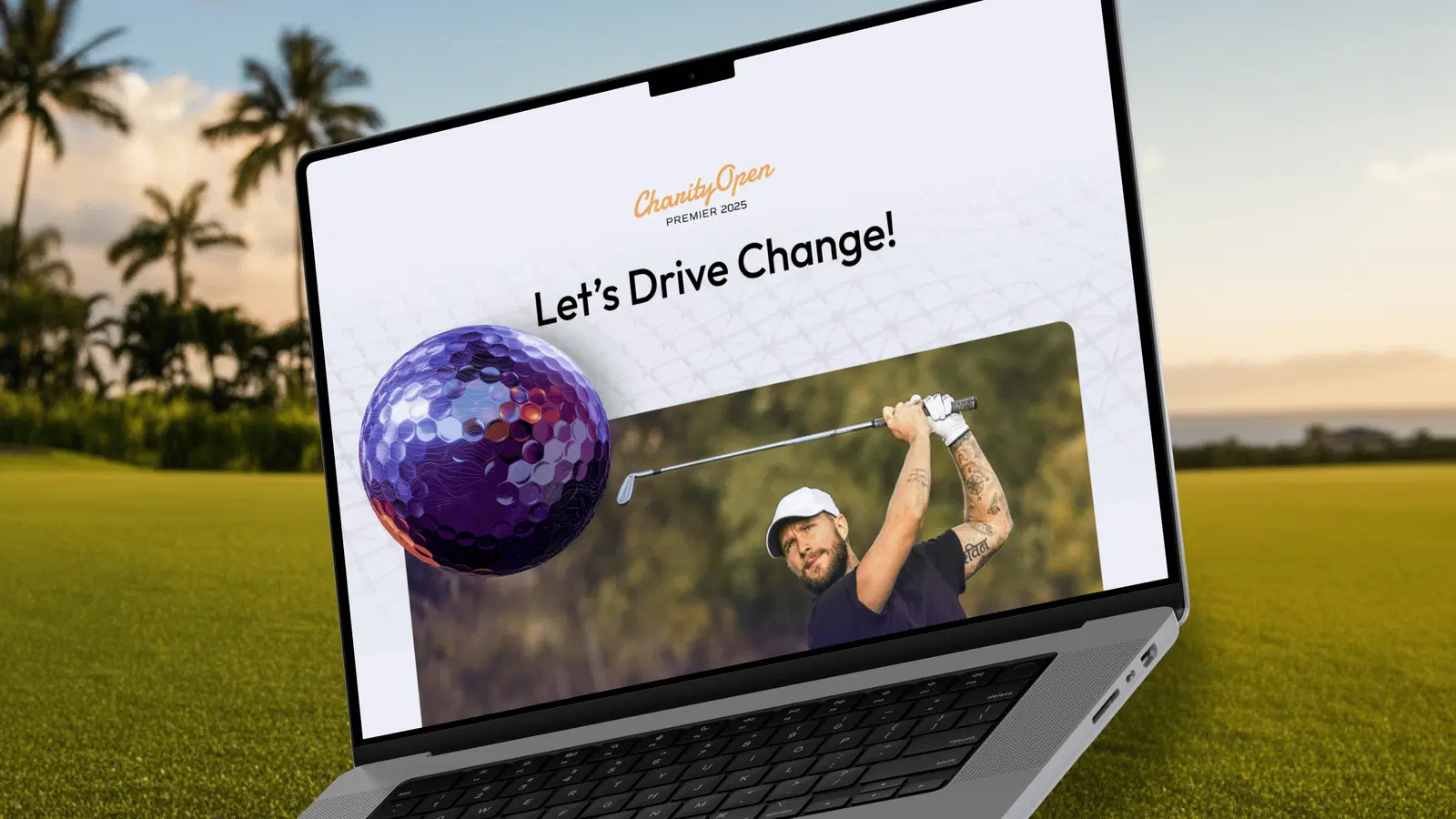 Laptop displaying the Premier Charity Golf website with a golfer swinging and the slogan ‘Let’s Drive Change’.